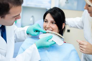 Dentist examining teeth