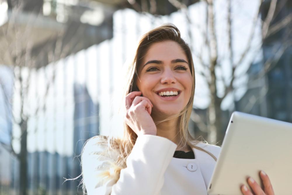 Woman On Phone | Dental Implants in Gaithersburg