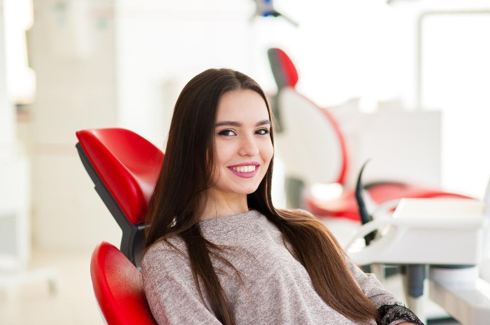 Woman getting a dental exam in Gaithersburg, Maryland