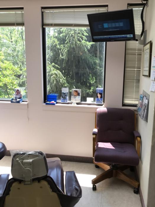 Dental room with tv above chair | Lakeforst Dental Associates