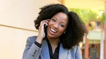 Woman talking on cell phone | Gaithersburg MD Dentist