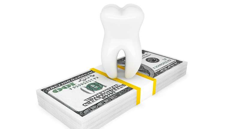 Money and a tooth | Dental Insurance Gaithersburg, MD